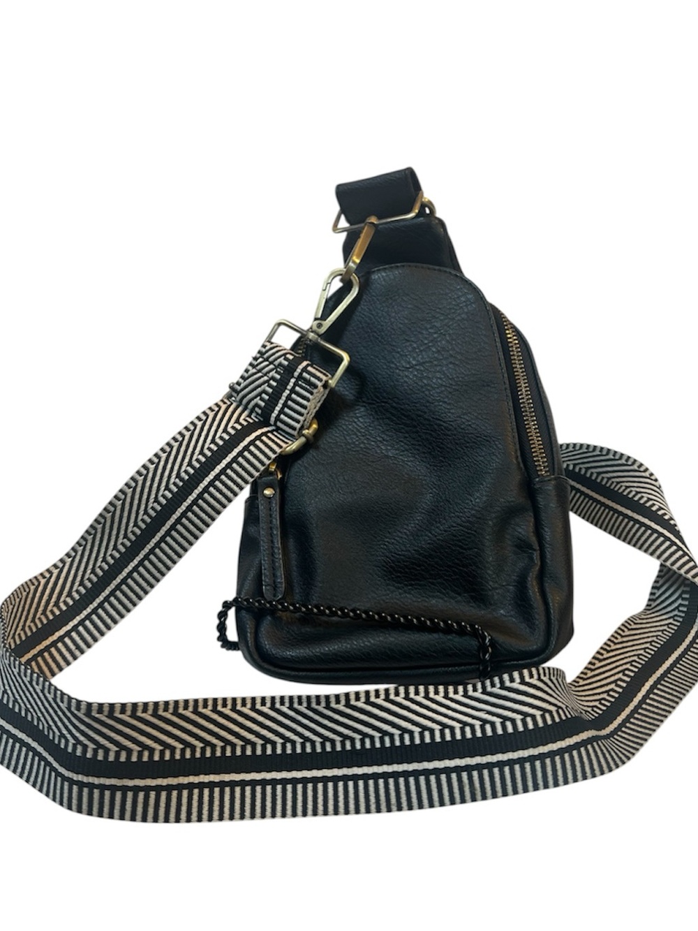 Black Vegan Leather Crossbody Sling Bag with Patterned Strap by Anthropologie.